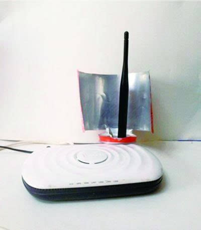 用易拉罐真能增强WiFi信号？记者与热心读者任先生一起做起实验